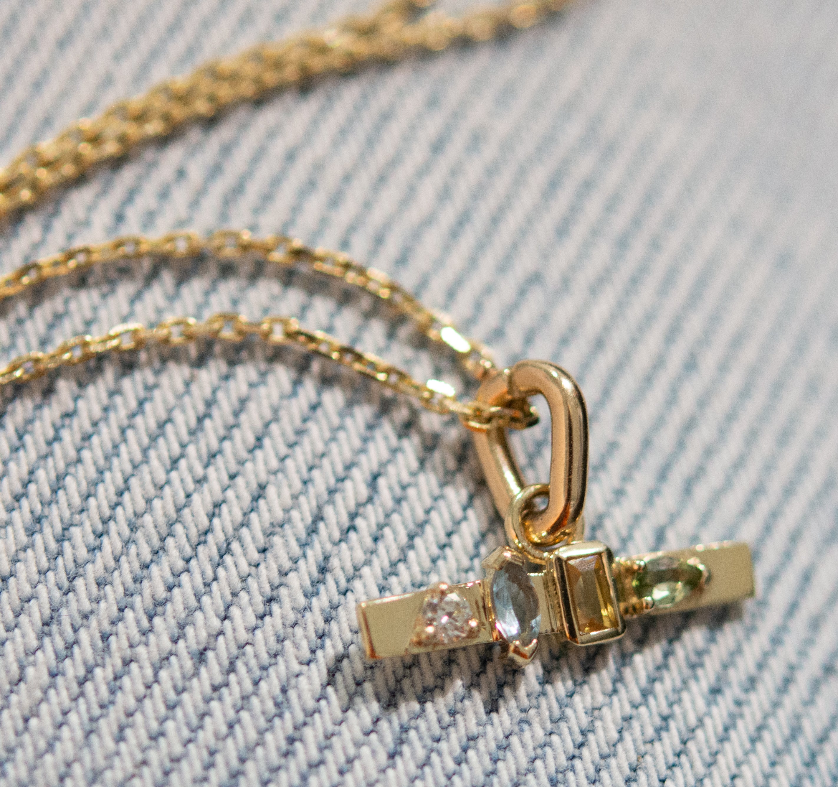 Metier by tomfoolery AM-PM pendant on gold chain
