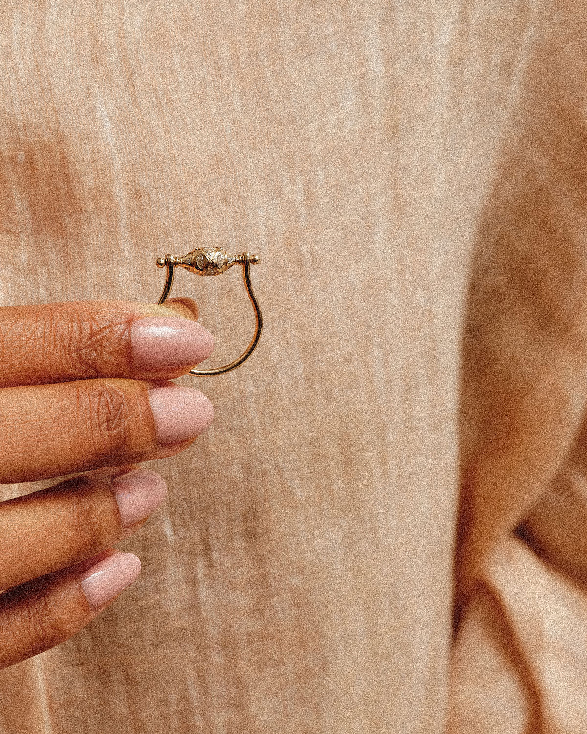 Ojo Mudra AZ Diamond Spinner Ring on model