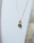 Metier by Tomfoolery pear cut emerald pendant layered with classic gold square plaque