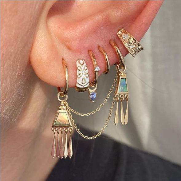 Metier by tomfoolery styled ear story featuring dala milgrain gemstone huggie earring in 9ct yellow gold with a marquise white diamond