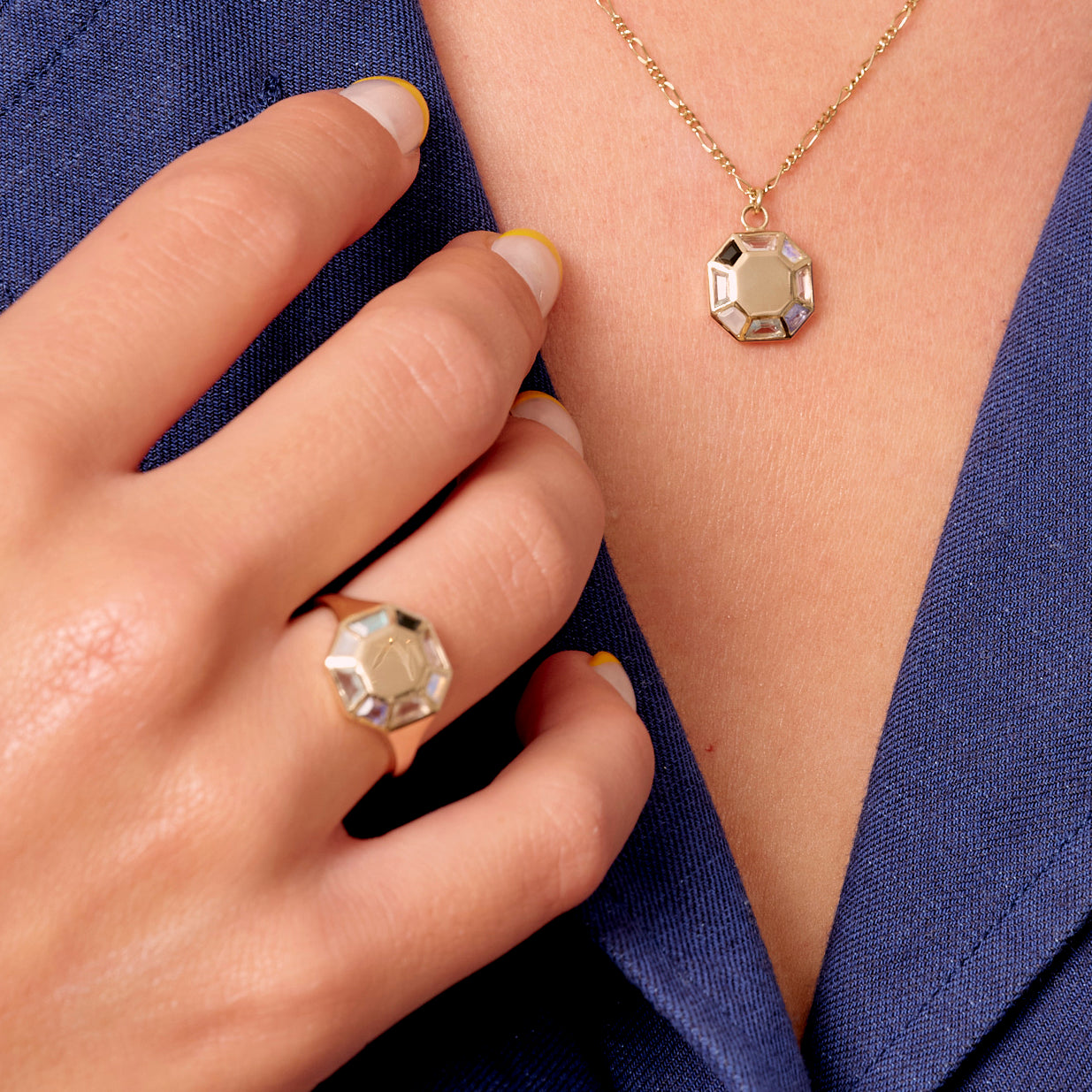 metier by tomfoolery:Pastel Octagon Ring on hand with pendant